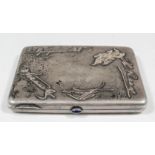 An early 20th Century Russian silvery metal and gold mounted rectangular cigarette case with ovoid