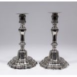 A pair of mid 18th Century French silver pillar candlesticks with reeded and octagonal knopped