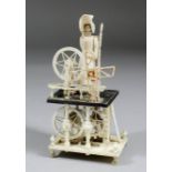 An early 19th Century turned and carved bone "Prisoner of War" work - "Spinning Jenny" - The