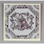 An 18th Century English Sadler & Green Delft tile with brown wood block printed design of a