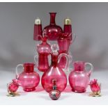 A Victorian cranberry and clear glass claret jug with spiral twist handle, ring to neck, 8ins