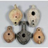 Five ancient pottery oil lamps, Roman and Islamic, various