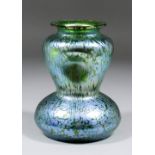 An early 20th Century glass "Jack-in-the-Pulpit" vase with iridescent oil spot finish, 10.25ins high