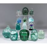 A Victorian green glass "Dump" with "Fountain" design, 4ins high, another of "Bullet" shape with