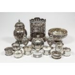 A Victorian silver urn pattern sugar castor of Neo-classical design, the domed pierced cover with