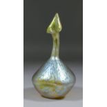 An early 20th Century bi conical glass vase of pinched form in the "Loetz" manner with iridescent