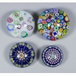 A Perthshire millefiori on muslin paperweight dated 1974, 3ins diameter, another with small star