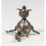 A George V silver table lighter in the form of a seated elf, 3ins high, by Philip Hanson Abbot,