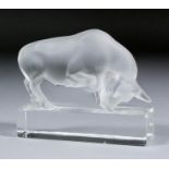 A modern Lalique glass model of a standing bull with head lowered, 3.5ins high (engraved mark -