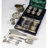 A set of six Edward VII miniature silver three handled tygs, 1.5ins high, by William Aitken,