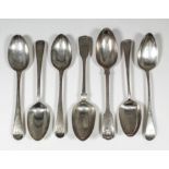 Four George III silver "Feather Edge" Old English pattern table spoons, three London 1785, one