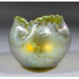 An early 20th Century glass bowl with pinched rim in the "Loetz" manner and with iridescent oil spot