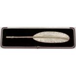 An Elizabeth II silver and silver gilt quill pen, 10.5ins, by Carrington & Co Ltd, London 1967, with