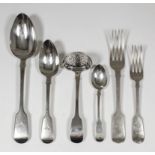 A Victorian harlequin silver fiddle pattern table service, comprising - four table spoons, twelve