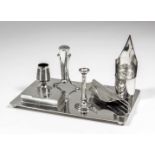 A late Victorian silver rectangular inkstand / desk tidy with nib pattern inkwell, curled page