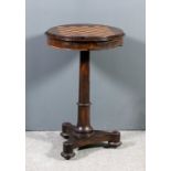 An early Victorian rosewood circular occasional table, the top with moulded edge and the