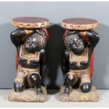 A pair of 20th Century Italian style carved, painted and giltwood "Blackamoor" stands carved with