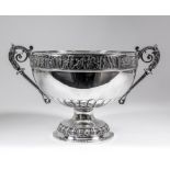 A late Victorian silver circular two-handled rose bowl of classical form, the rim cast with band