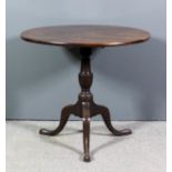 A 19th Century mahogany circular tripod occasional table, on turned central column and cabriole legs