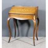 A late 19th Century French lady's rosewood and marquetry bureau with gilt brass gallery to top,