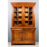 A modern French panelled cherrywood chiffonier bookcase, the upper part with moulded cornice, fitted
