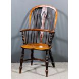 A 19th Century ash and elm seated stick back Windsor armchair, two tier stick back on turned