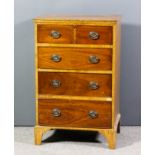 A 20th Century walnut secretaire chest of 18th Century design with cross banded top, fitted one