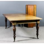 An early Victorian mahogany extending dining table with three extra leaves for same, with moulded