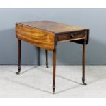 A George III mahogany Pembroke table with reeded edges and D-shaped flaps, fitted one real and one