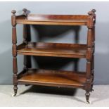 A Victorian mahogany three-tier tray top dinner wagon, with turned and reeded finials and turned and