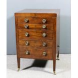 A George III gentleman's mahogany enclosed wash stand/secretaire, the plain folding top opening to