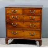 A George III mahogany chest with moulded edge to top, fitted two short and three long graduated