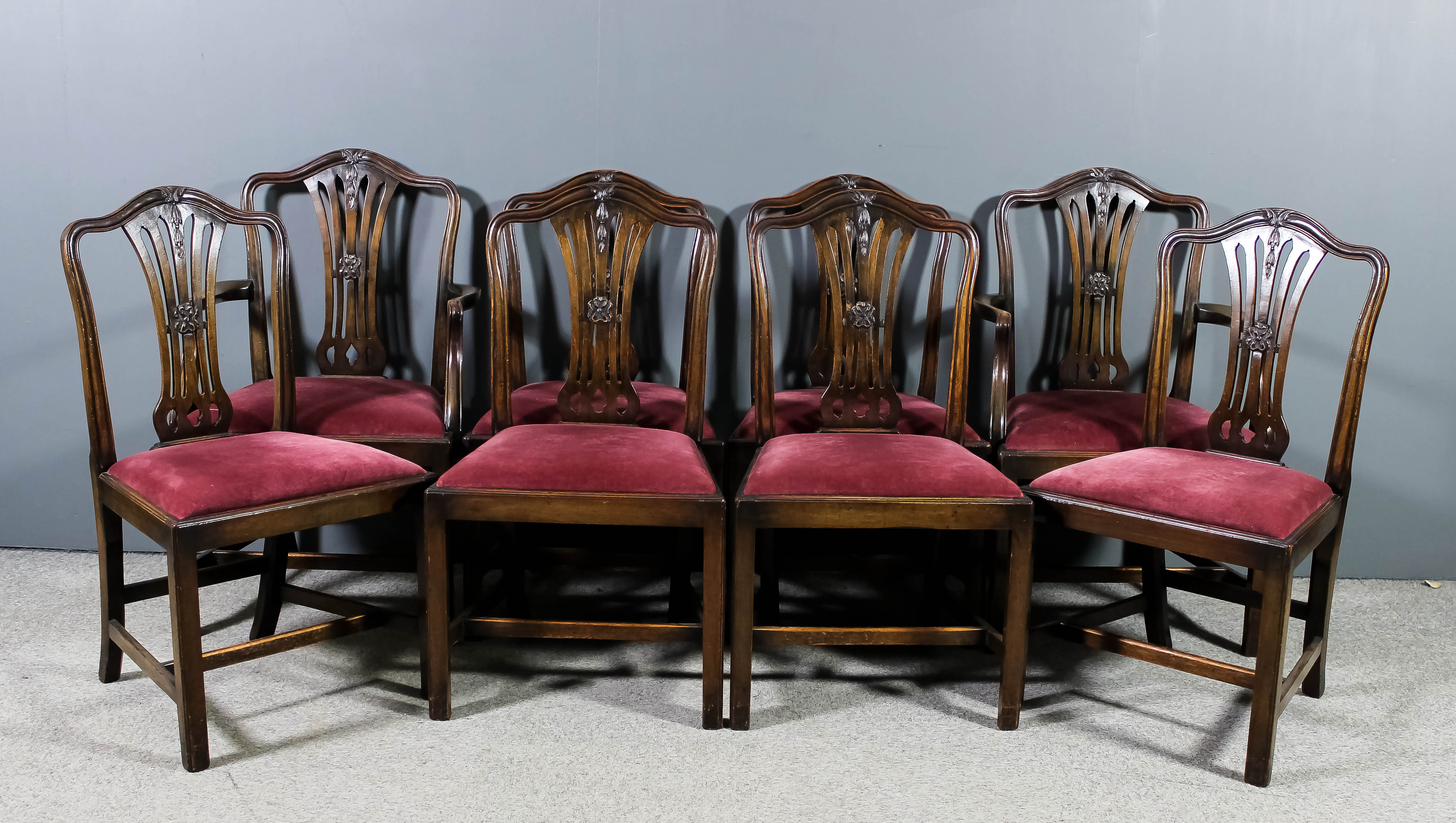 A set of eight 1920s mahogany dining chairs of "Hepplewhite" design (including two armchairs),