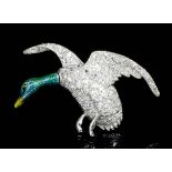 A modern silvery coloured metal mounted enamel and diamond set flying duck pattern brooch, the