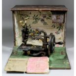 A late 19th Century Weir's 55 /- sewing machine, 8.5ins high, together with original instruction