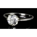 An Edwardian silvery coloured metal mounted diamond solitaire, the old cut stone approximately 1.