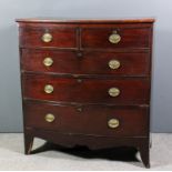 A late Georgian mahogany bow front chest with rounded edge to top, fitted two short and three long