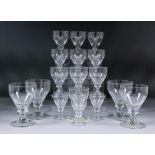 A part suite of English table drinking glasses with bucket bowls over a plain blade knop, with plain