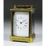 A late 19th/early 20th Century French carriage clock No.3418, the white enamel dial with Roman