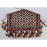 A Turkman Asmalyk woven in navy blue, dark green, rose and ivory with a trellis design filled with