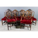 A set of seven early 20th Century mahogany shield back dining chairs of "Hepplewhite" design (