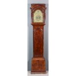 An early 18th Century walnut longcase clock by Nathaniel Tilly of London, the 12ins arched brass