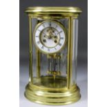 A late 19th Century French oval "Four Glass" mantel clock, No.144 64, the 4.5ins diameter white