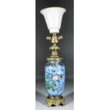 A Japanese cloisonné vase, decorated to two panels with birds amongst flowering branches,