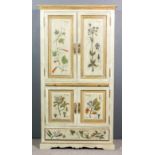 A Bavarian green painted panelled wood two-tier cupboard decorated with plant specimens, fitted