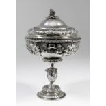 A Victorian Regimental silver gilt cup and cover of Mannerist design, the whole cast with scroll