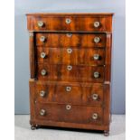 A 19th Century Continental mahogany chest in the "Biedermeier" manner, fitted three long drawers and