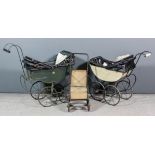 A late Victorian black cloth covered dolls pram, 34ins long x 31.5ins high, another similar, 31ins