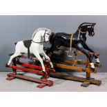 A black painted rocking horse with horse hair tail, mounted on pine stand and with turned