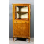 An early 20th Century French walnut, kingwood and gilt brass mounted display cabinet, with red